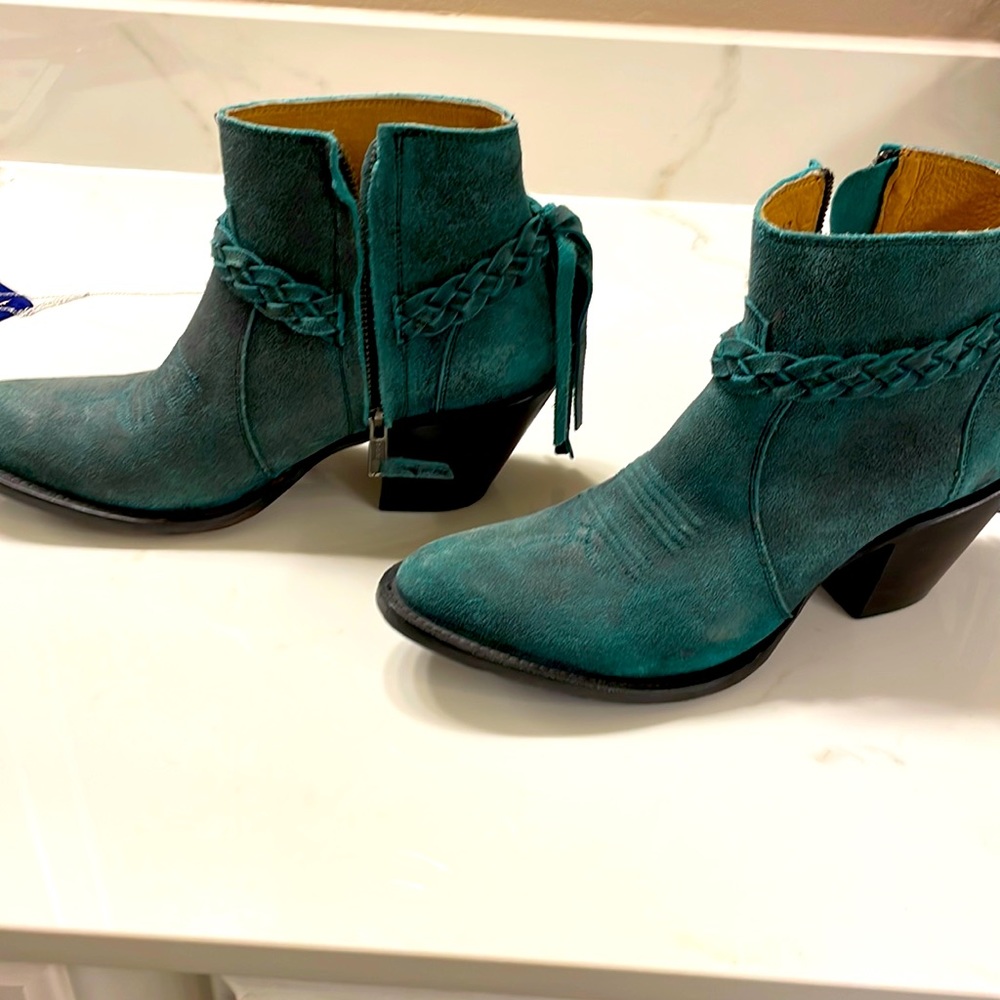 Shyanne teal booties.  Hardly worn.  Very good condition.